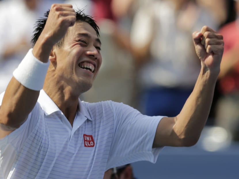 Kei Nishikori, of Japan, reacts after defeating Novak Djokovic, of Serbia, in the semifinals of the 2014 US Open tennis tournament, Sept 6, 2014. Photo: AP