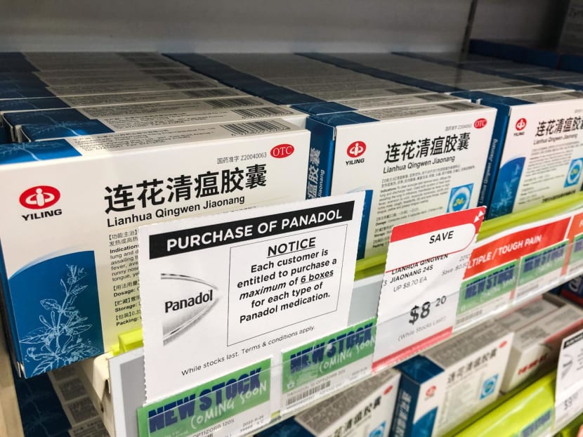 A notice on a purchase limit for Panadol put up in front of boxes of traditional Chinese medicine Lianhua Qingwen at a store on Dec 23, 2022.