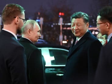 Russian President Vladimir Putin sees off Chinese President Xi Jinping after a reception following their talks at the Kremlin in Moscow on March 21, 2023.