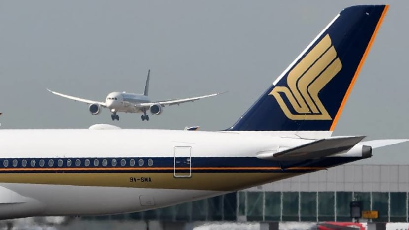 Singapore Airlines profit plunges despite record revenue Singapore Airlines profit plunges despite record revenue