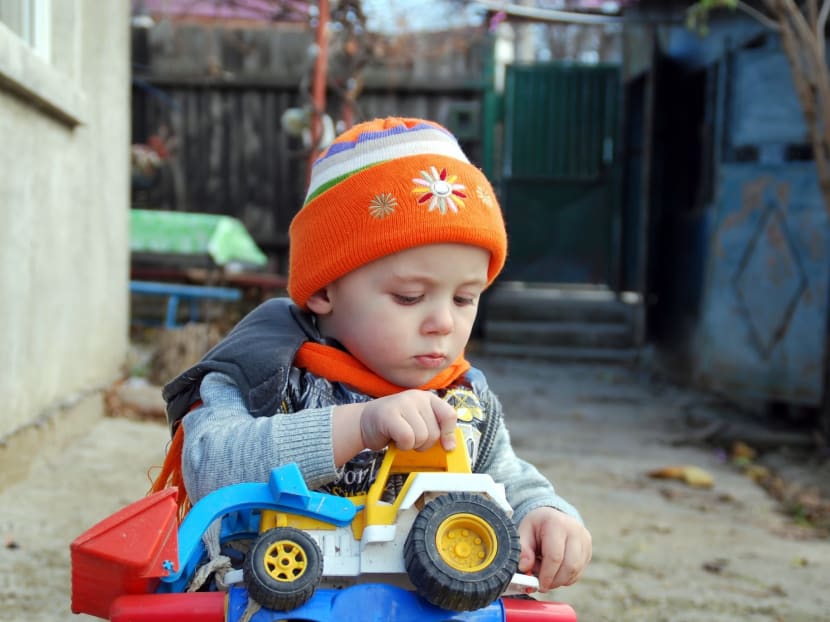 A child playing with a toy vehicle. Photo: www.freeimages.com