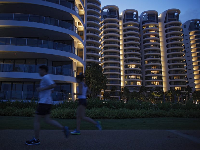 Joggers pass a largely vacant condominium on Singapore's Sentosa island in this file photo. Photo: Reuters