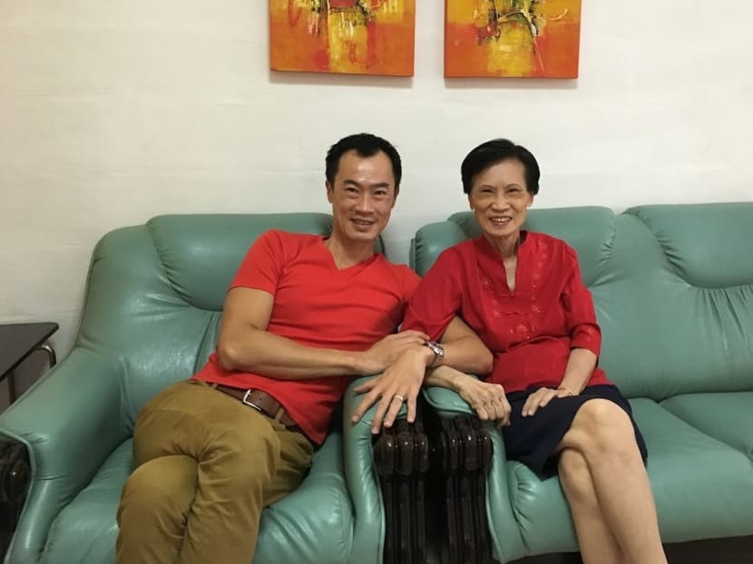 The author with his mother in this photo taken at her home in February 2016 during Chinese New Year. Her dementia has worsened to a stage where she no longer recognises him.