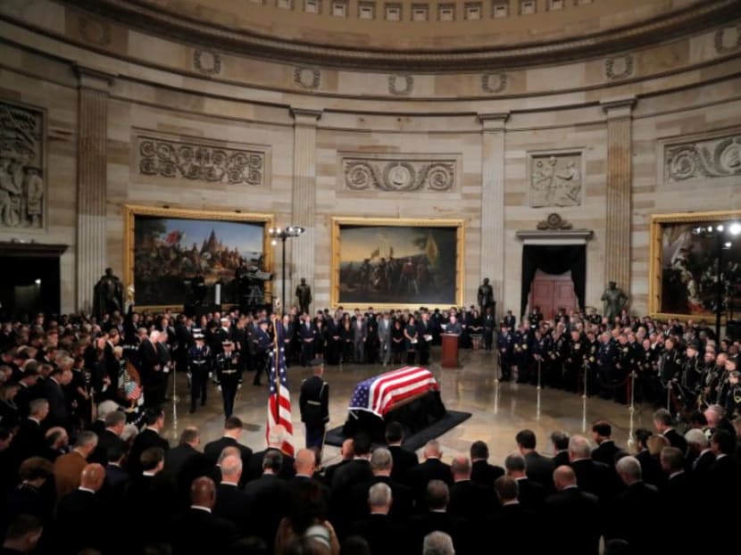 Photo of the day: The casket carrying the remains of the late former US President George HW Bush stands inside the US Capitol rotunda during ceremonies in Washington DC, US.