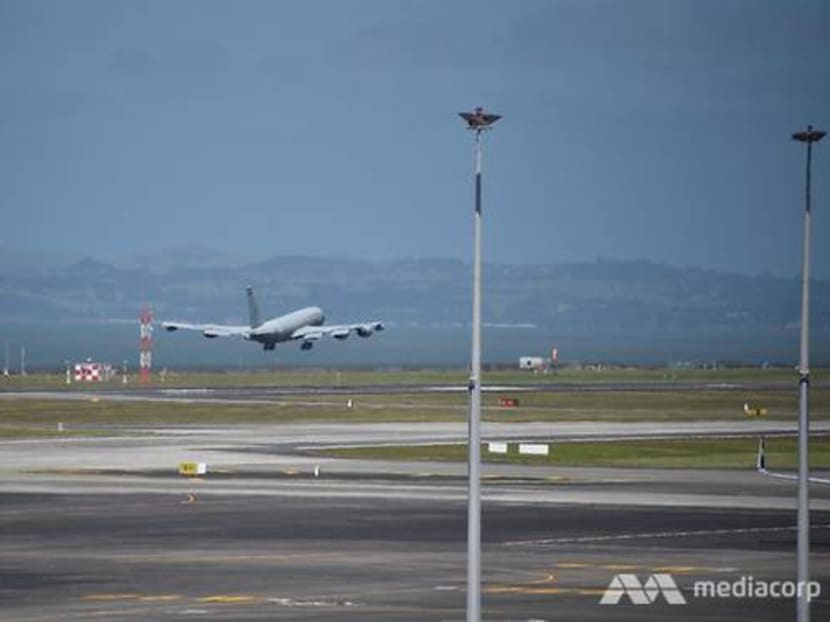 The KC-135 aircraft carrying Aloysius Pang's body makes its way home on Jan 25.