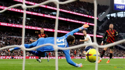 Kane's record-breaking goal seals Tottenham win over Man City