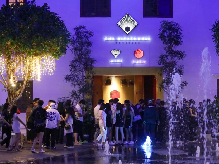 Partygoers waiting to enter Club Yang in Clarke Quay at around 11pm on April 20, 2022.