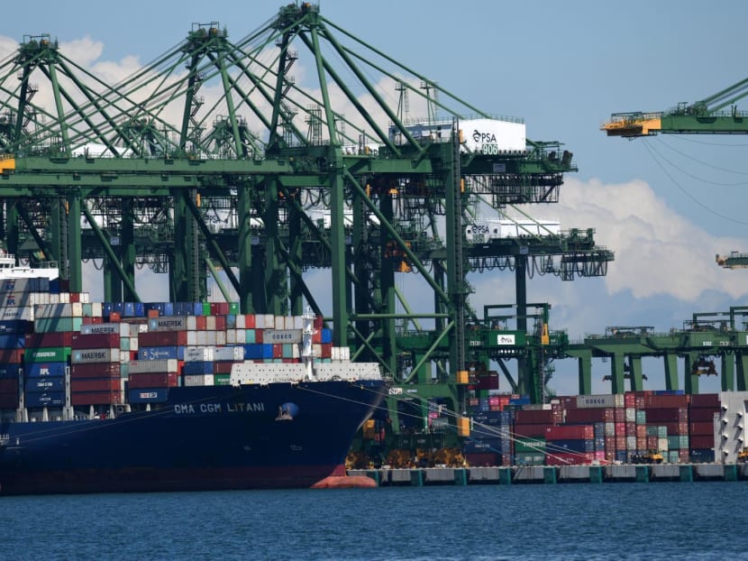 A container vessel is docked at the port in Singapore on July 16, 2020.