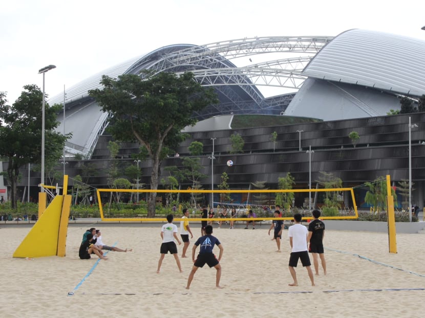 Students playing a game of beach volleyball at the Singapore Sports Hub. TODAY file photo