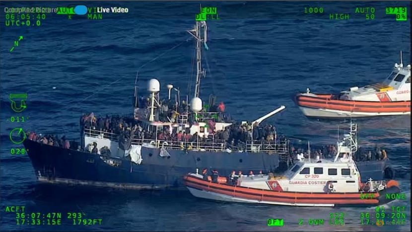 Italy's coastguard works to rescue 1,200 migrants drifting at sea Italy's coastguard works to rescue 1,200 migrants drifting at sea