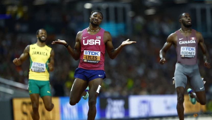 Lyles clocks fastest time in semis after cart crash