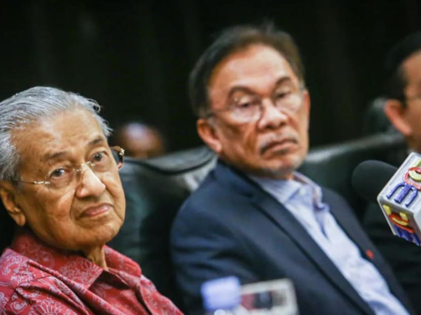 Dr Mahathir Mohamad (left) said Mr Anwar Ibrahim (right) did not have the support of the Malay community as they viewed him as a liberal.