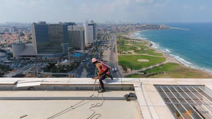Squeegee selfies: Tel Aviv tower-washer is rising TikTok star Squeegee selfies: Tel Aviv tower-washer is rising TikTok star