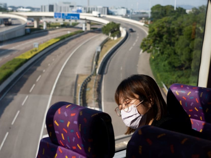 This picture taken on Nov 14, 2021 shows a passenger sleeping on a bus operated by a Hong Kong travel agency offering five-hour "quiet bus" tour marketed as a "route to nowhere" for travel-craving and restless residents to snooze on board in Hong Kong. This picture taken on Nov 14, 2021 shows a passenger sleeping on a bus operated by a Hong Kong travel agency offering five-hour "quiet bus" tour marketed as a "route to nowhere" for travel-craving and restless residents to snooze on board in Hong Kong.