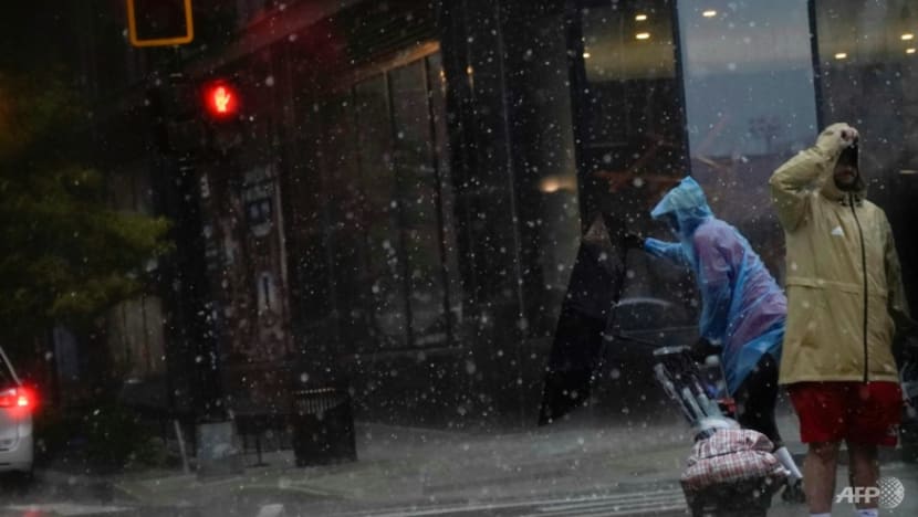 Two dead, thousands without power as storms batter eastern US