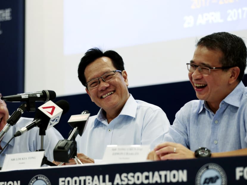 Lim Kia Tong (second from right) and Mr Edwin Tong (right), vice-president of the Football Association of Singapore from 2013 to 2020, at a press conference in 2017 after Lim's election as the association's president.