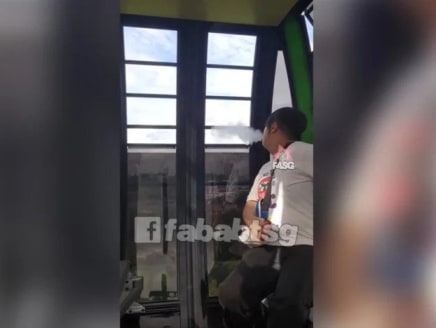The 24-year-old man, who was thought to be a teenager, is seen vaping in a Sentosa cable car.