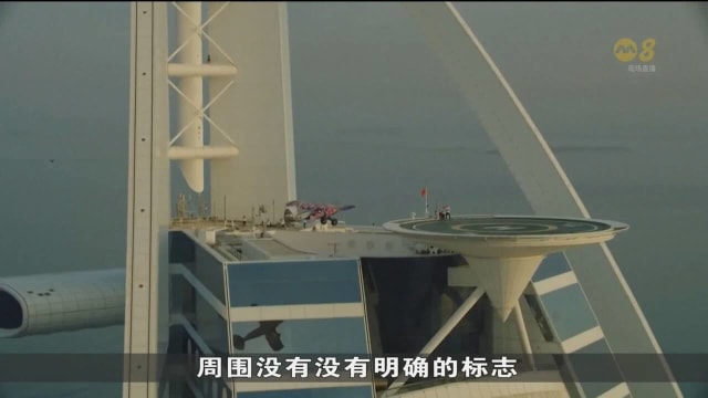 全球首个！特技飞行员成功降落迪拜酒店停机坪