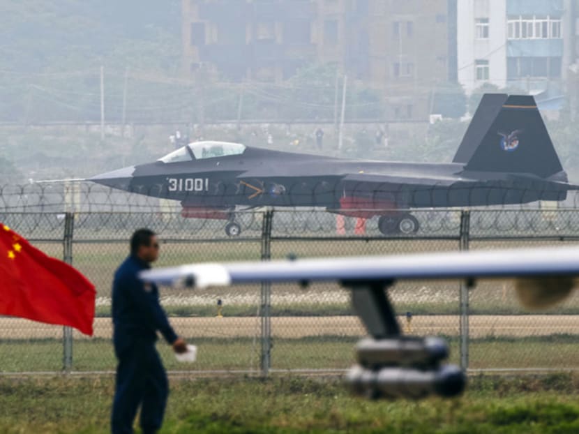 A J-31 stealth fighter (background) of the Chinese People’s Liberation Army air force. Photo: Reuters
