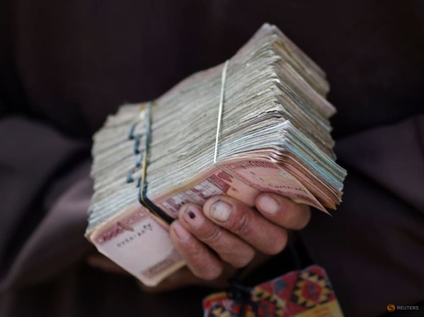 Taliban launch charm offensive with Afghan banks amid funding fears Taliban launch charm offensive with Afghan banks amid funding fears