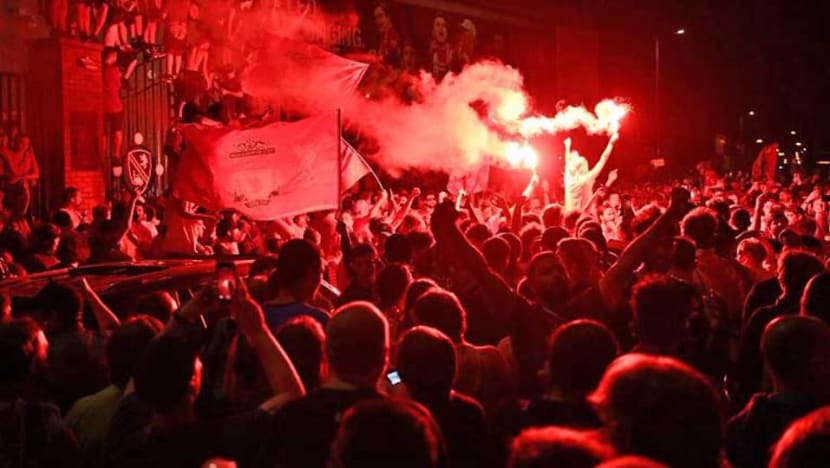 Liverpool fans turn the city red after breaking 30-year Premiership drought Liverpool fans turn the city red after breaking 30-year Premiership drought