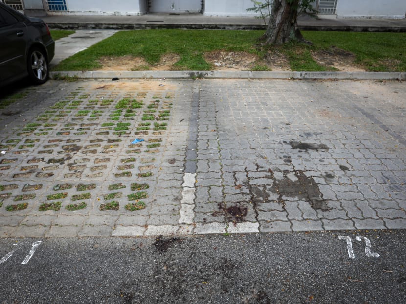 Blood stains at an open-air car park next to Block 176 Boon Lay Drive, seen on April 7, 2022.