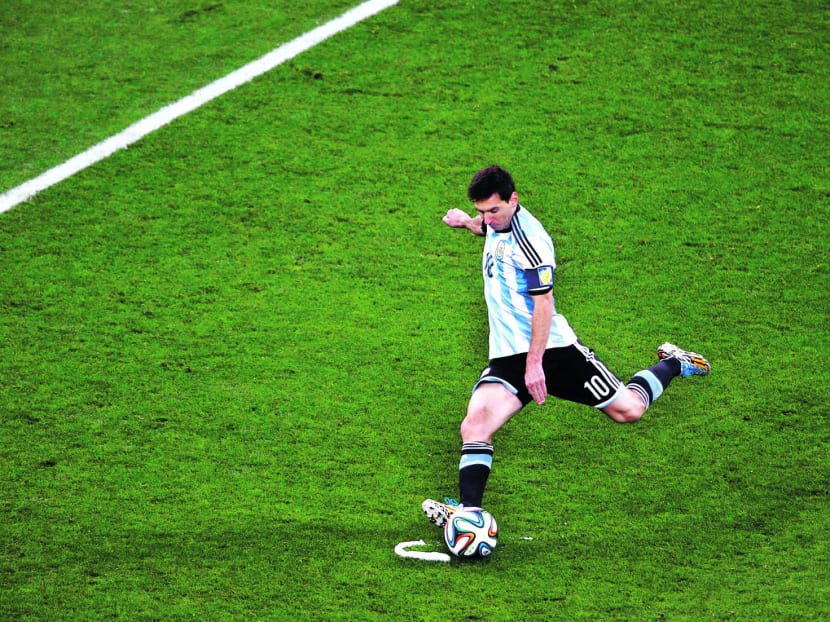 Argentina’s Lionel Messi taking a free kick during the 2014 World Cup semi-finals between Argentina and the Netherlands at the Corinthians arena in Sao Paulo July 9, 2014. PHOTO: REUTERS