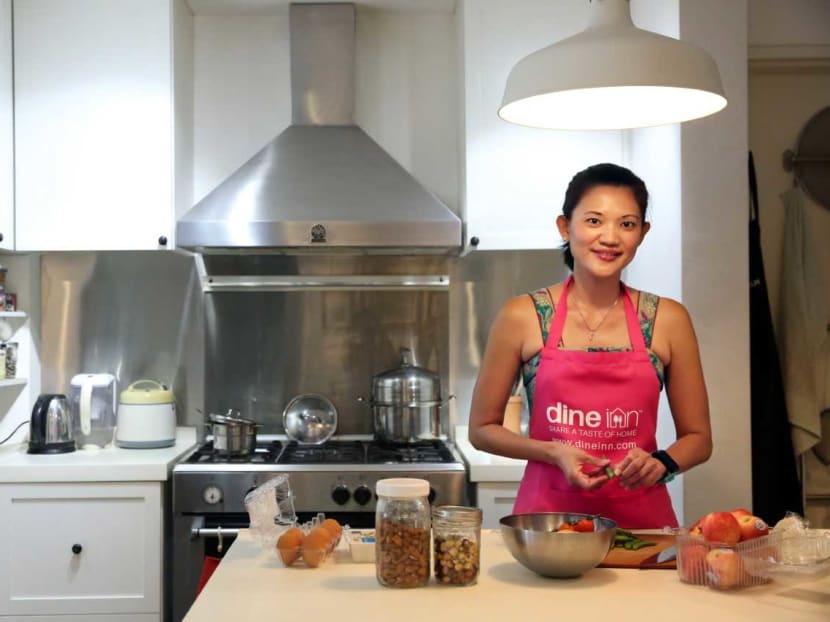 Ms Raynne Ong, 41, is one of a growing band of aspiring chefs using homegrown app Dine Inn to provide private dining services with food she prepares at home. Some customers dine at her house, while others get take-away.