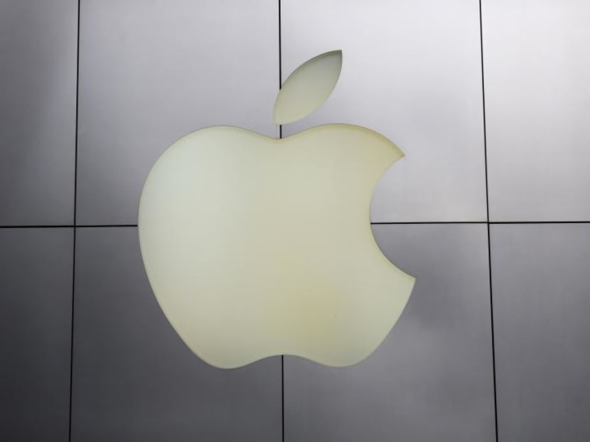 The Apple logo outside a store. Photo: REUTERS