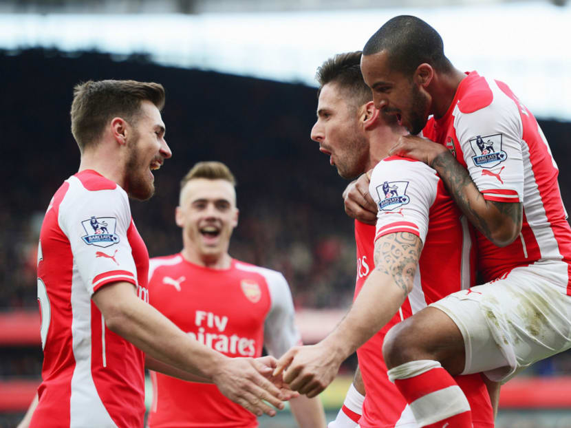 Red-hot Arsenal have won 19 of their past 24 matches. PHOTO: GETTY IMAGES