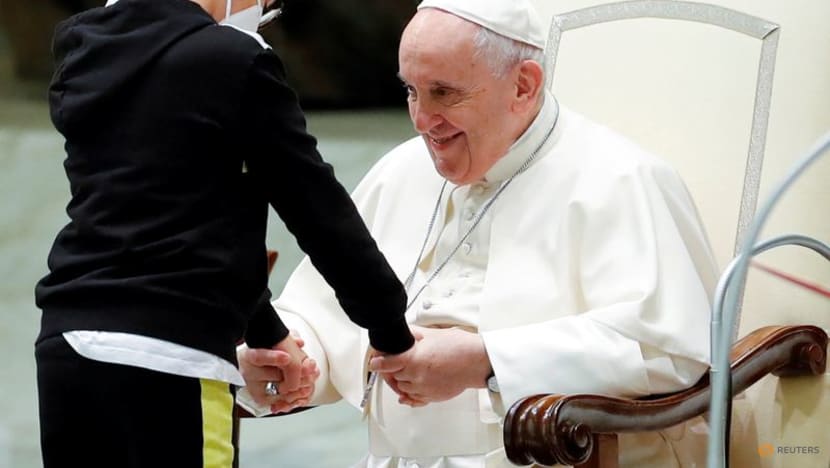 Persistent boy steals show at papal audience Persistent boy steals show at papal audience