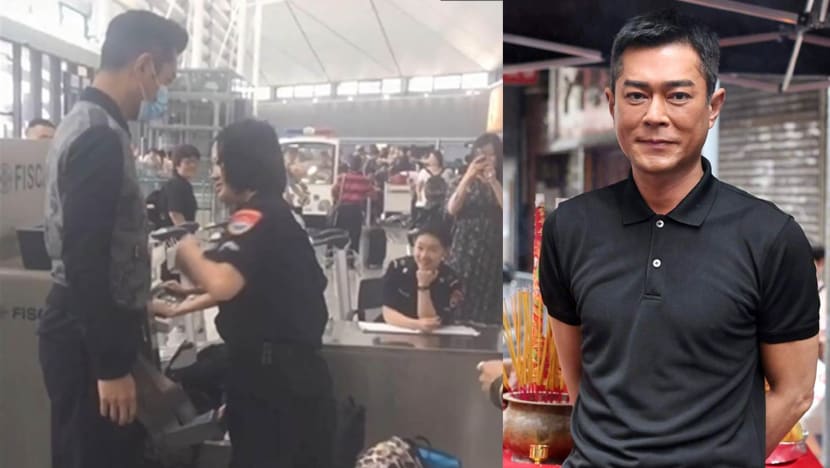 Photo Of Airport Security Officer Smiling While Giving Louis Koo A Pat-Down Goes Viral
