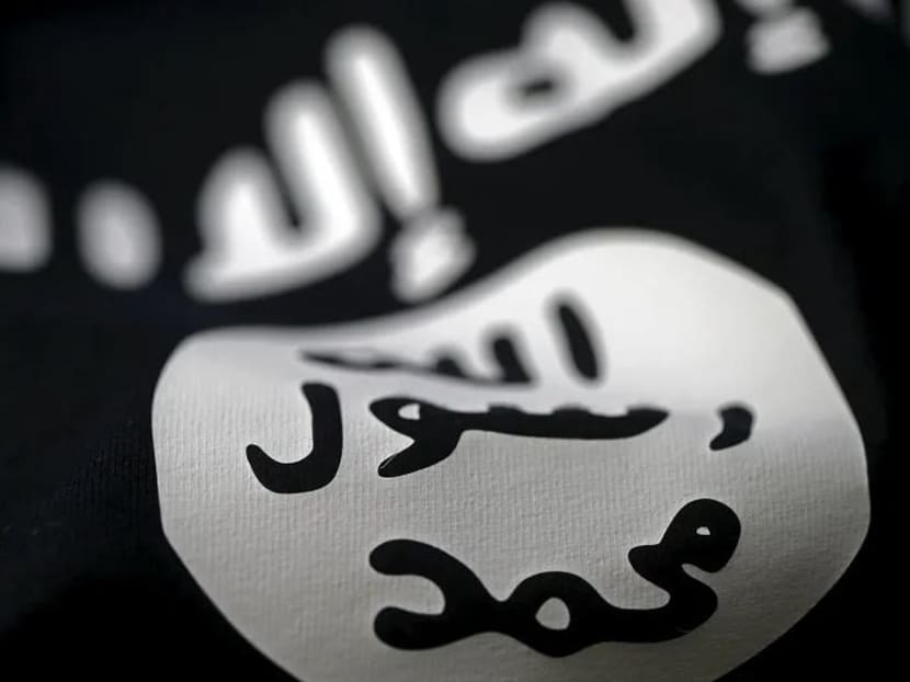 A flag of the Islamic State in Iraq and Syria (Isis). A 17-year-old secondary school student had been radicalised by a foreign online contact who introduced him to pro-Isis social media groups in 2017, MHA said.