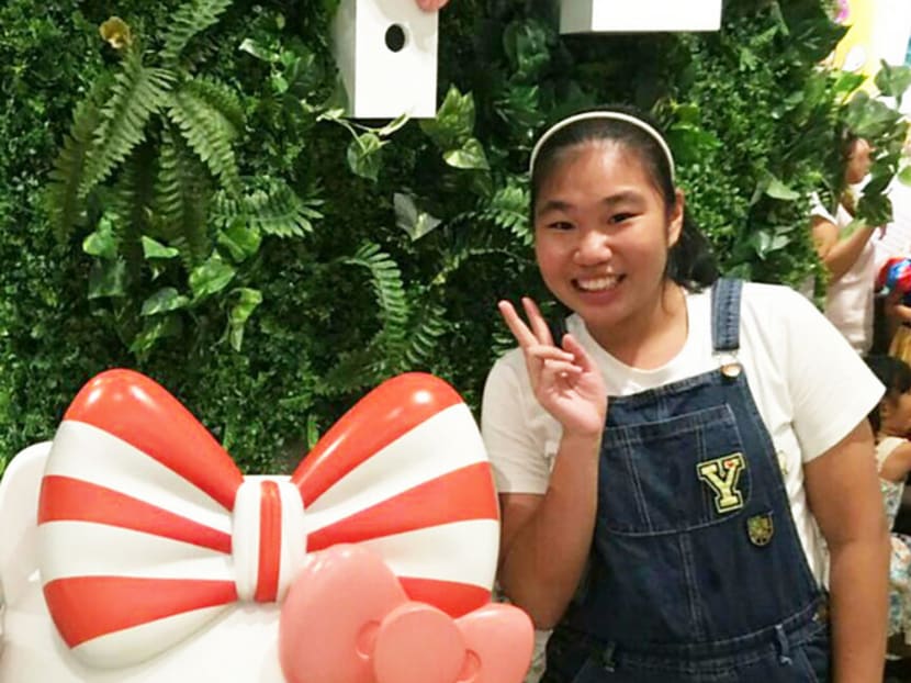 Lau Ling Jie, 15, was diagnosed with the autoimmune disease lupus at the age of 11. She is still on regular follow-up doctor’s visits and takes 18 pills every day. PHOTO: LAU LING JIE