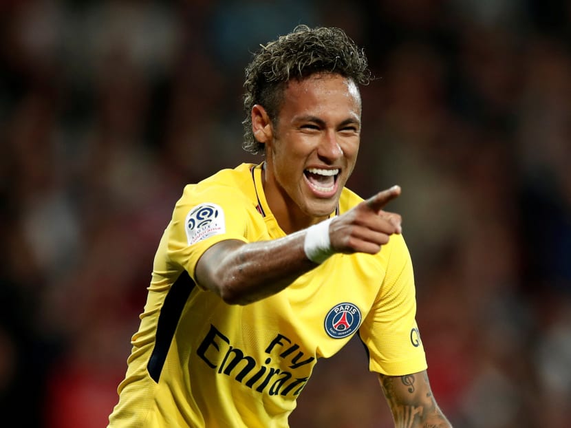 Paris Saint-Germain’s Neymar celebrates scoring their third goal. Photo: Reuters