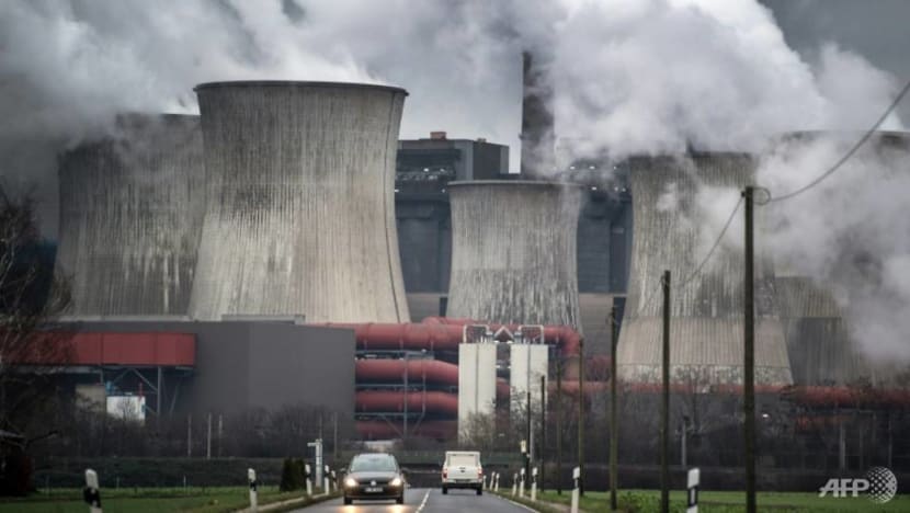 Explainer: Mitigation efforts for a world warming by less than 2 degrees Explainer: Mitigation efforts for a world warming by less than 2 degrees