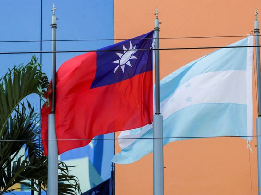 FILE PHOTO: The flags of Taiwan and Honduras flutter in the wind outside the Taiwan Embassy in Tegucigalpa, Honduras March 15, 2023. REUTERS/Fredy Rodriguez/File Photo