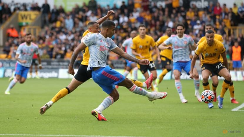 Football: Man United's Greenwood snatches late win at wasteful Wolves Football: Man United's Greenwood snatches late win at wasteful Wolves