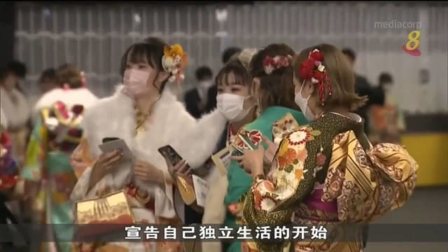 年满20岁日本男女穿戴正式出席成人礼