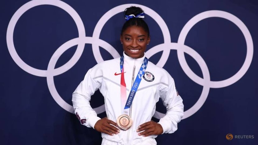 Olympics-Gymnastics-Many 'twisties' and turns, but Biles exits Games a champion Olympics-Gymnastics-Many 'twisties' and turns, but Biles exits Games a champion