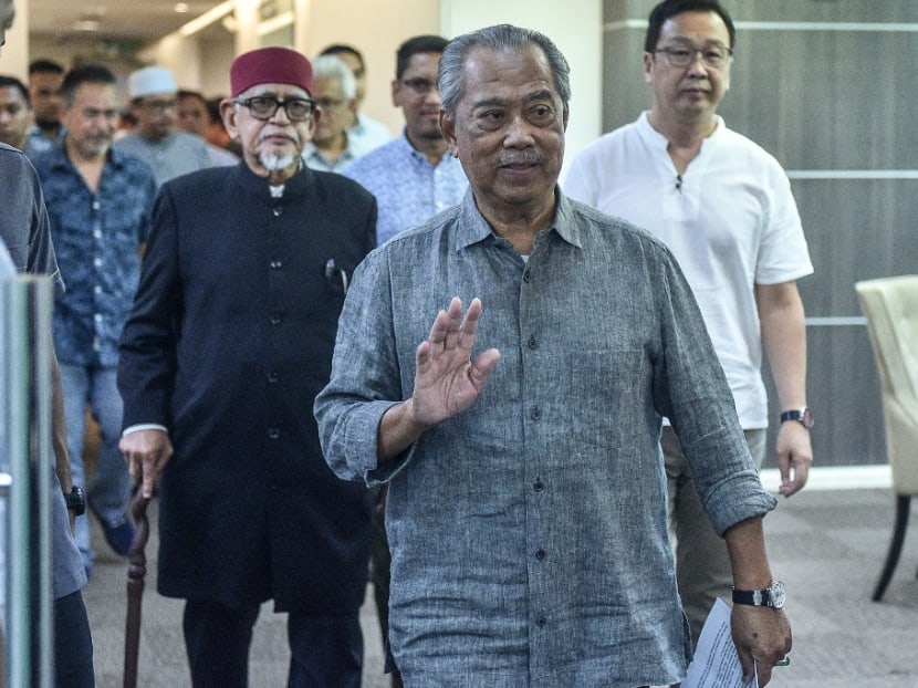 Perikatan Nasional chairman Muhyiddin Yassin arrives to attend a press conference at the party's headquarters in Kuala Lumpur, on Nov 24, 2022.
Perikatan Nasional chairman Muhyiddin Yassin arrives to attend a press conference at the party's headquarters in Kuala Lumpur, on Nov 24, 2022.