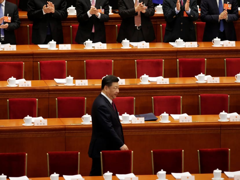 Mr Xi deployed speed, secrecy and intimidation to smother potential opposition inside and outside the Chinese Communist Party to change the two-term limit. Photo: Reuters