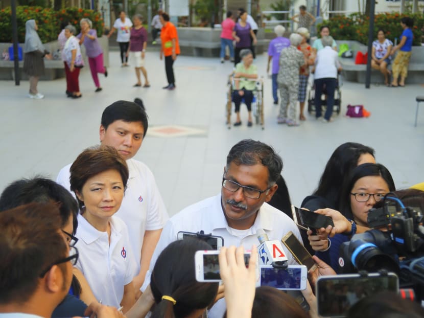 PAP's Murali Pillai speaking to members of the media on the sidelines of a walkabout around the Bukit Batok block 229 area. Photo: Ernest Chua