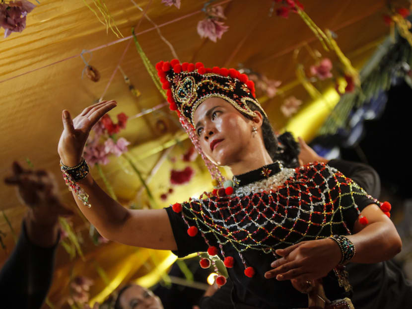 Ms Rohana Abdul Kadir in the lead role of Pak Yong, during the opening sequence of Menghadap Rebab. The traditional dance theatre is banned in Kelantan since 1998 but heritage groups like Pusaka are trying to keep Mak Yong alive by lending support to performing communities. Photo: Courtesy of Pusaka