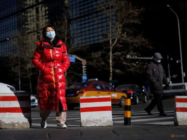 Beijing tightens rules for entering city after Omicron case