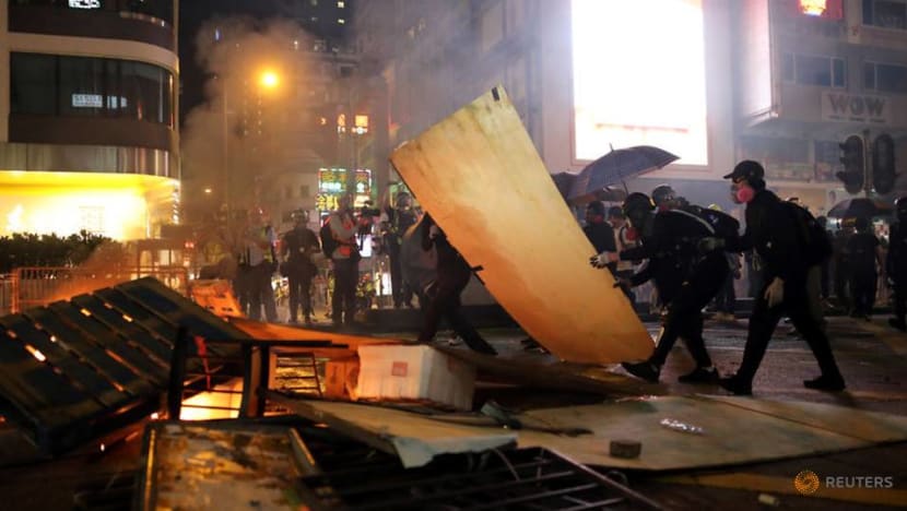 Hong Kong firms, lacking riot insurance, pick up pieces from protest damage Hong Kong firms, lacking riot insurance, pick up pieces from protest damage