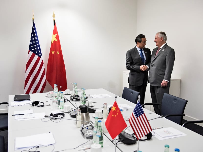 US Secretary of State Rex Tillerson (R) is greeted by China's Foreign Minister Wang Yi before a meeting at the World Conference Center on Feb 17, 2017 in Bonn, western Germany. Photo: Reuters
