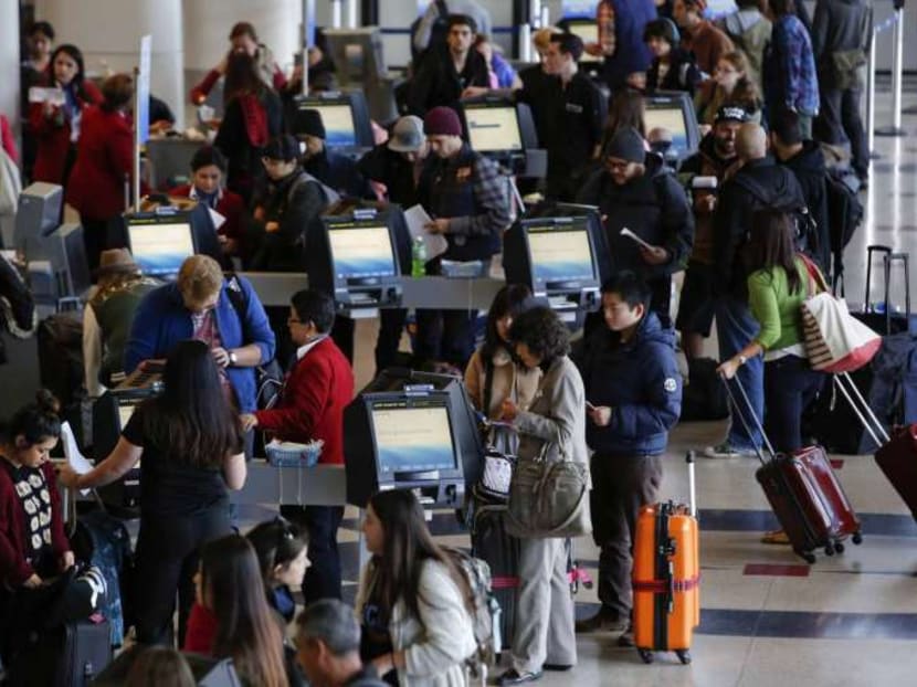 Passengers at Los Angeles International Airport. Bloomberg file photo