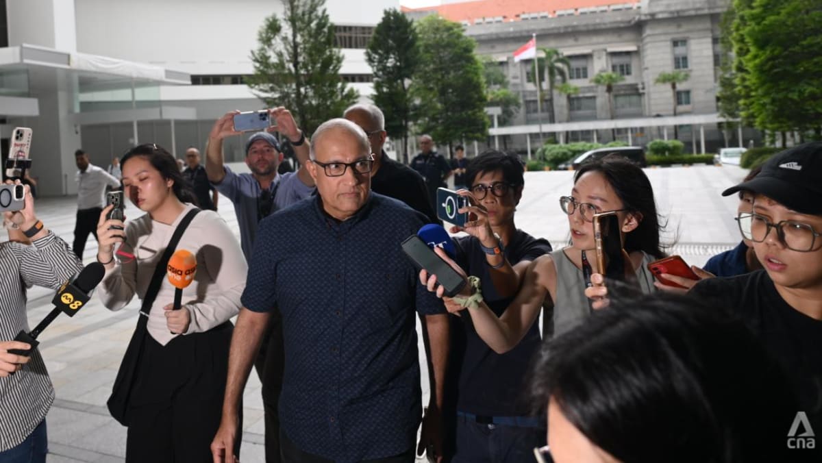 Former transport minister S Iswaran arrives at the State Courts to surrender and begin jail term