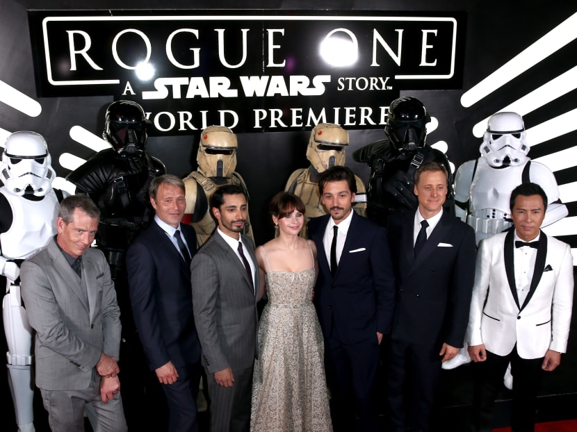 Cast of Rogue One: A Star Wars Story pose for a photo during the premiere of the movie at the Pantages Theatre, Hollywood, Dec 10, 2016. Photo: AFP